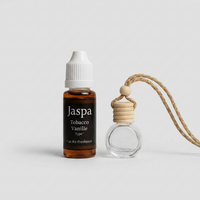 Tobacco Vanille Type Car Diffuser with Refill on grey studio background
