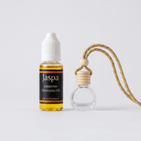 Japanese Honeysuckle Car Diffuser with Refill on grey studio background