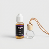 Pixie Dust Car Diffuser with Refill on grey studio background